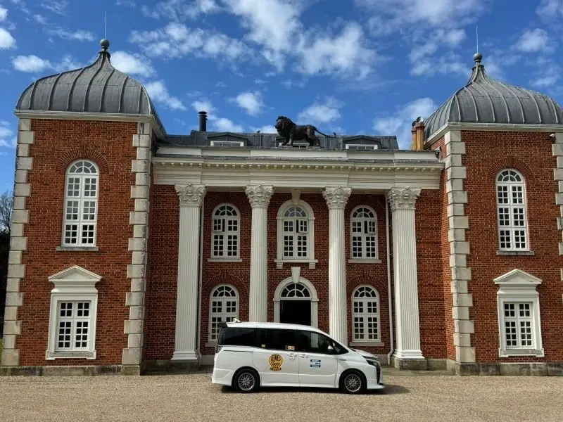 Lewes District Taxis people carrier outside a country house in East Sussex